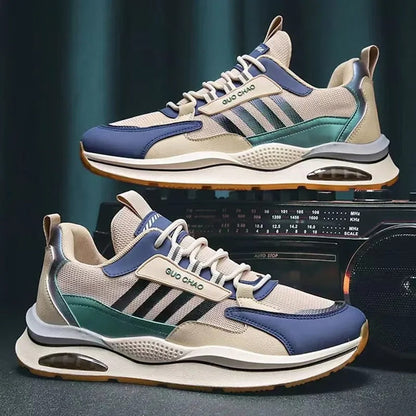 Moderne zwart-grijze sportschoen met oranje accenten, ademend mesh, en stevige zool. Perfect voor hardlopen en casual streetwear.